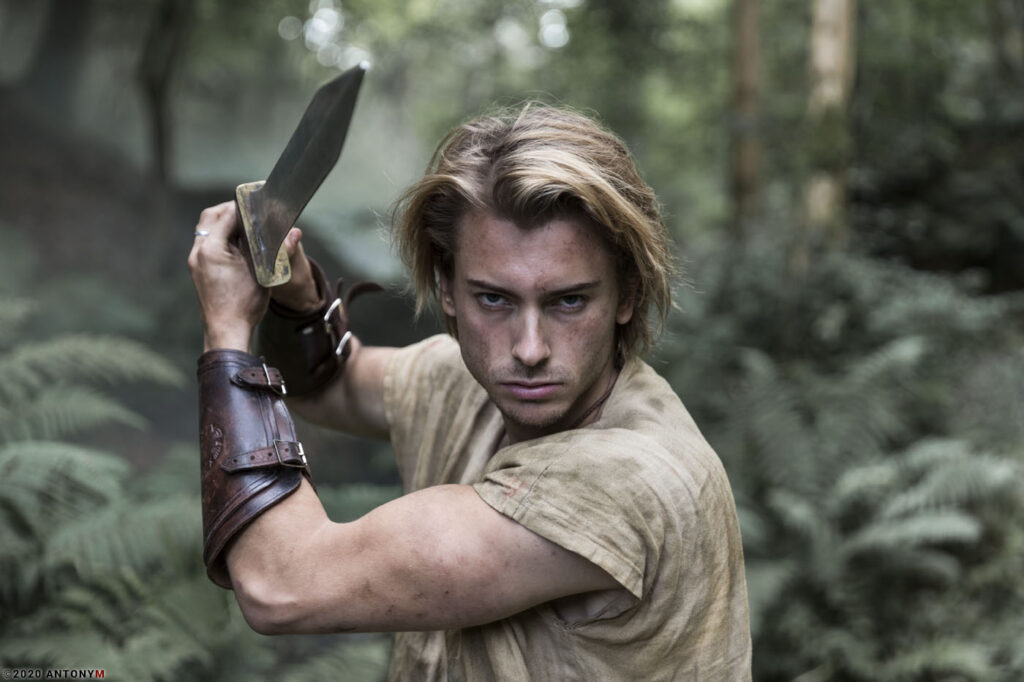 roman man in action with sword part of movie called caledonia on imdb